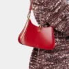 Borsa in pelle con piccoli anelli