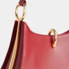 Borsa in pelle con piccoli anelli