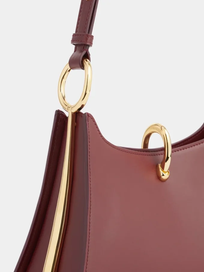 Borsa media in pelle con anelli