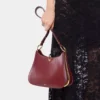 Borsa media in pelle con anelli