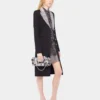 Cappotto lungo in lana con collo in paillettes