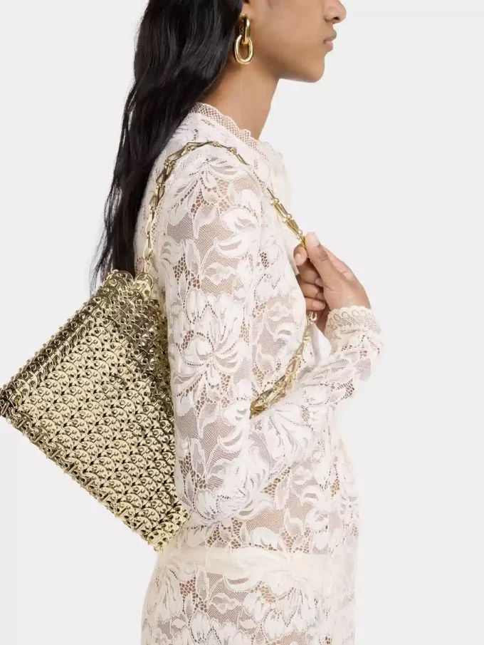 Iconica borsa color oro chiaro del 1969