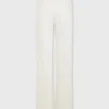 Jeans bianco sporco con dischi 1969