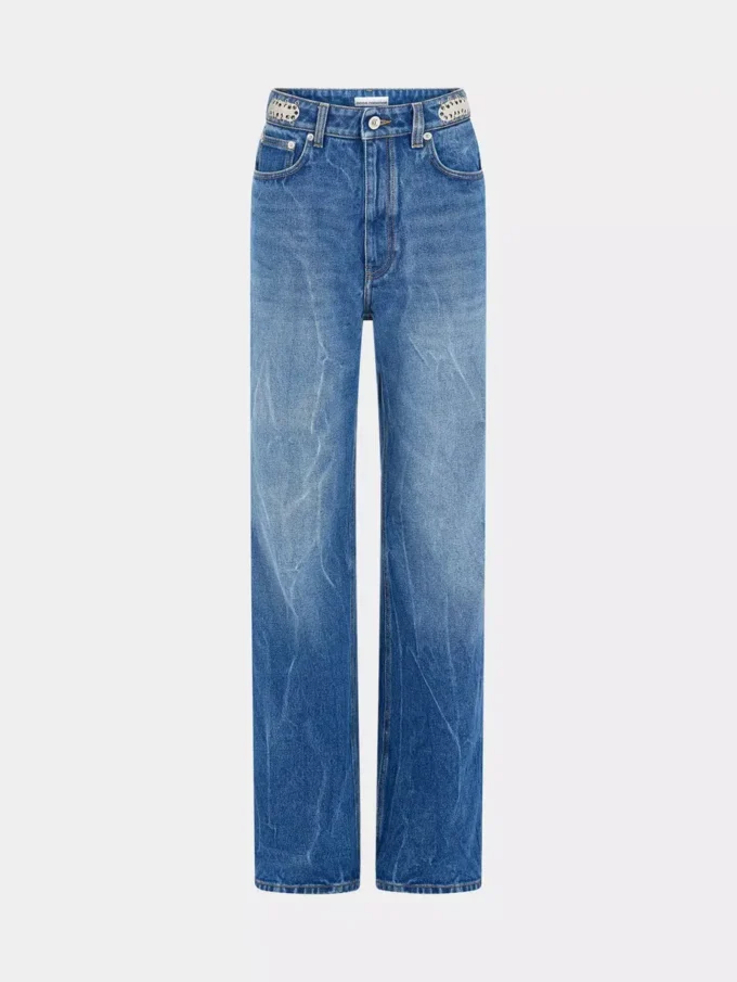 Jeans iconici con dischi metallici 1969