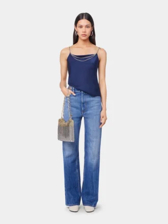 Jeans iconici con dischi metallici 1969