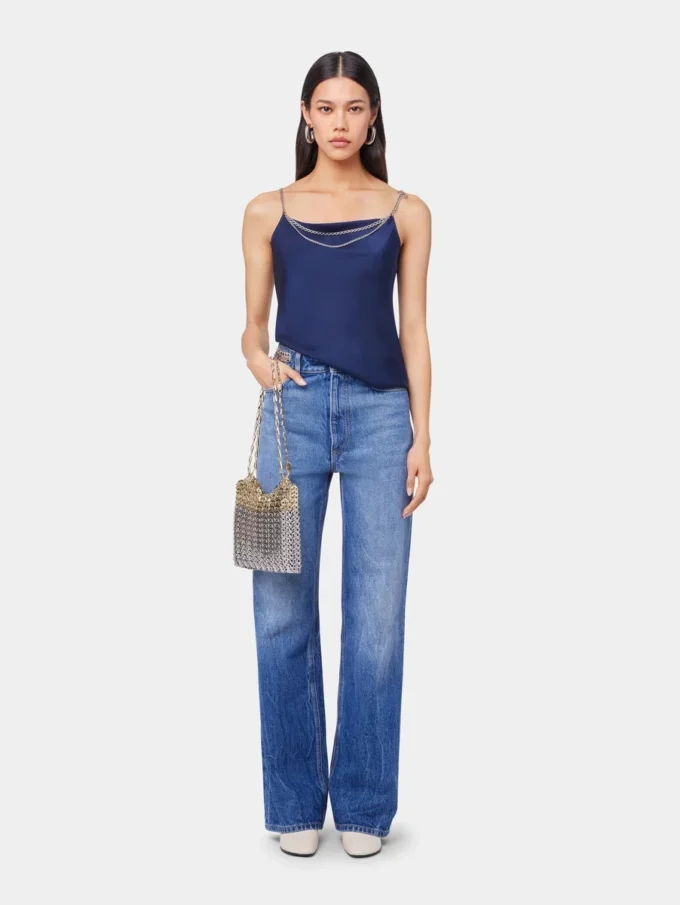 Jeans iconici con dischi metallici 1969