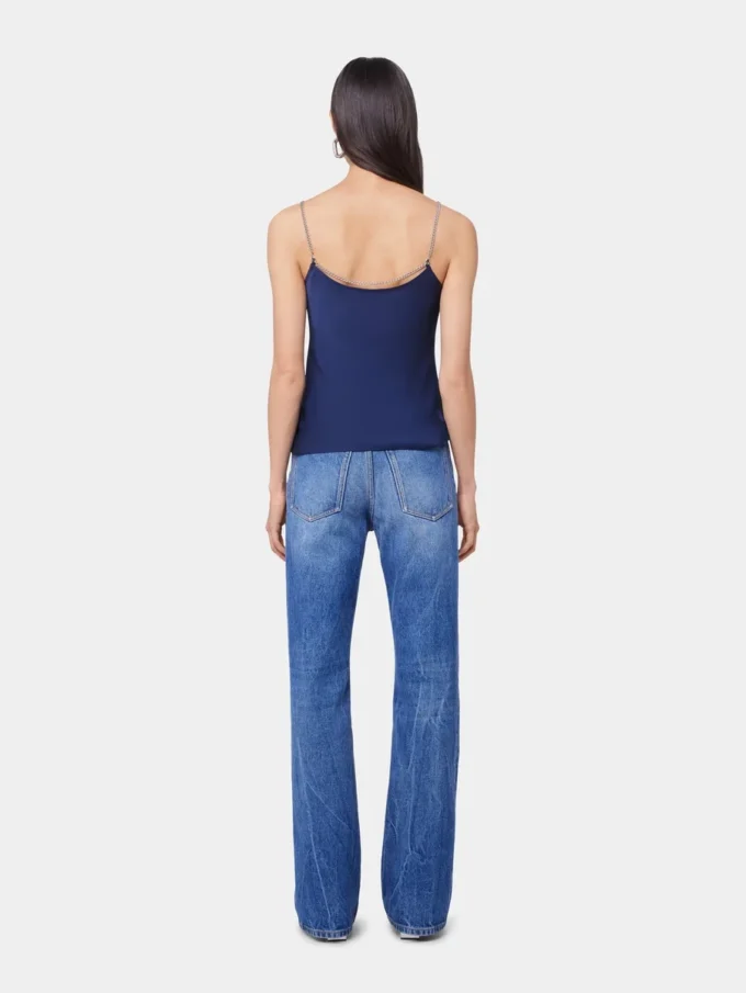 Jeans iconici con dischi metallici 1969