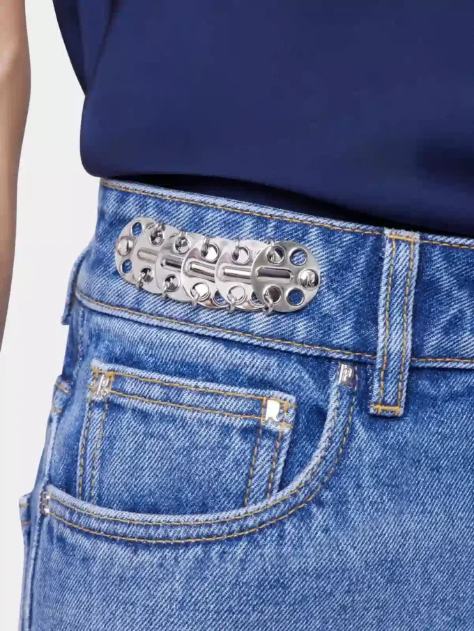 Jeans iconici con dischi metallici 1969