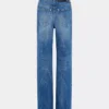 Jeans iconici con dischi metallici 1969
