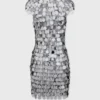 L’iconico abito Sparkle con dischi argentati