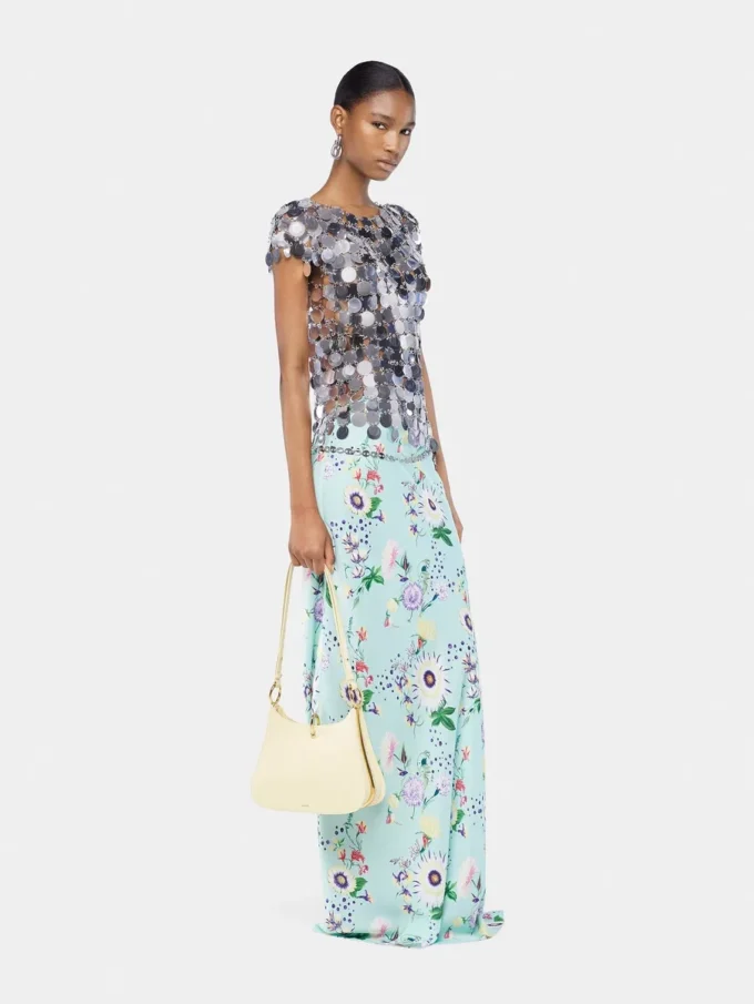 L’iconico top con dischi Sparkle argentati