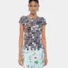 L’iconico top con dischi Sparkle argentati