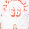 T-shirt in cotone stampato con piercing