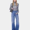 Top a collo alto con paillettes