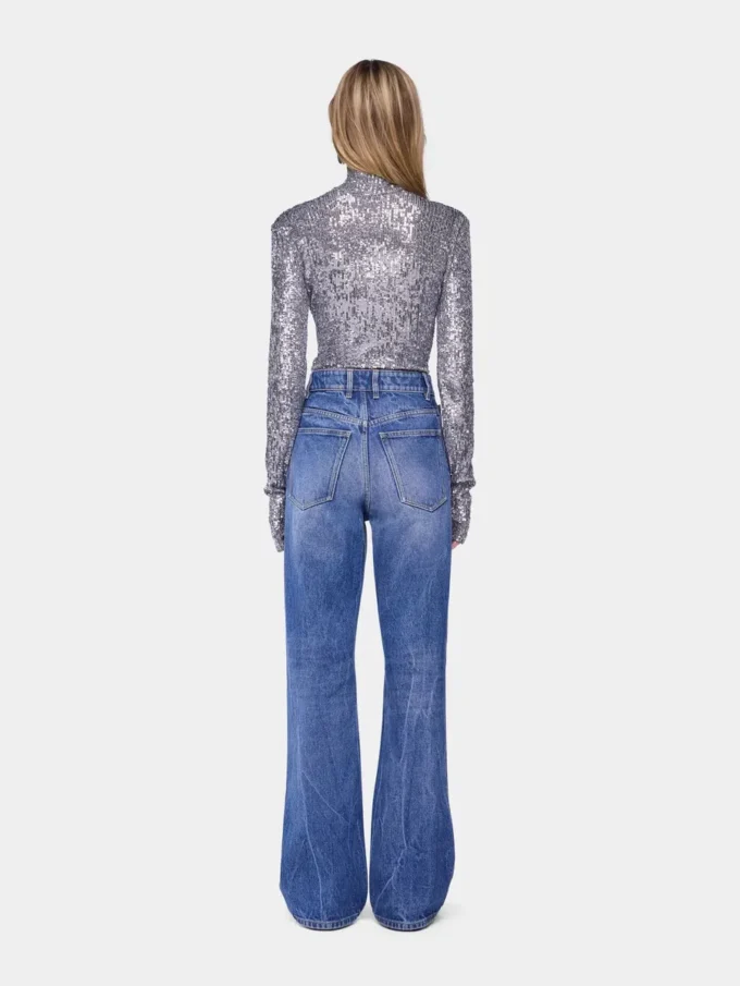 Top a collo alto con paillettes