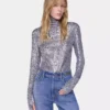 Top a collo alto con paillettes