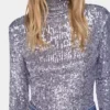 Top a collo alto con paillettes