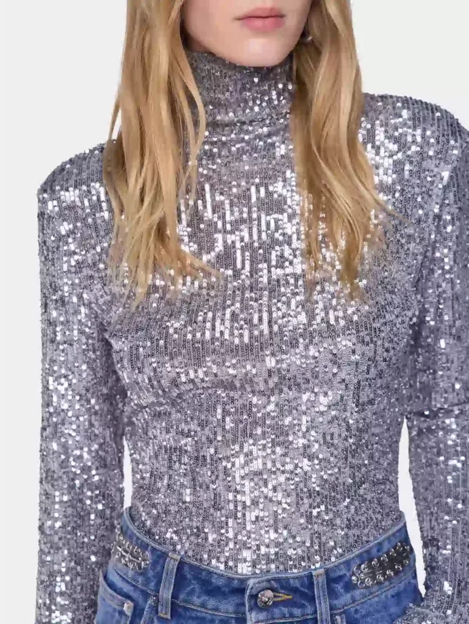Top a collo alto con paillettes