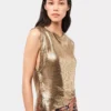 Top in maglia metallica dorata